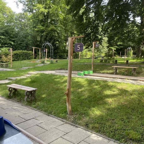 Mini golf course in the Velbert-Langenberg forest climbing park with hole 5 in the foreground followed by hole 6